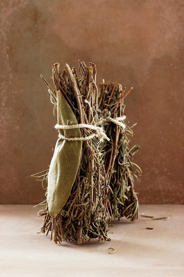Dried Bunches Of Herbs With Thyme, Bay Leaves, Rosemary And Oregano Photograph by Petr Gross