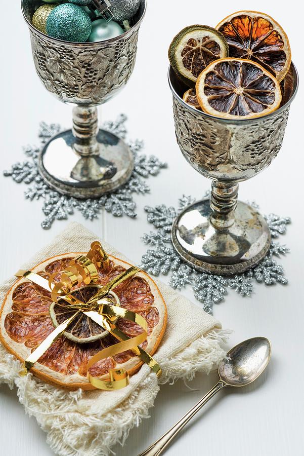 Dried Citrus Fruits As A Christmas Decoration Photograph by Komar