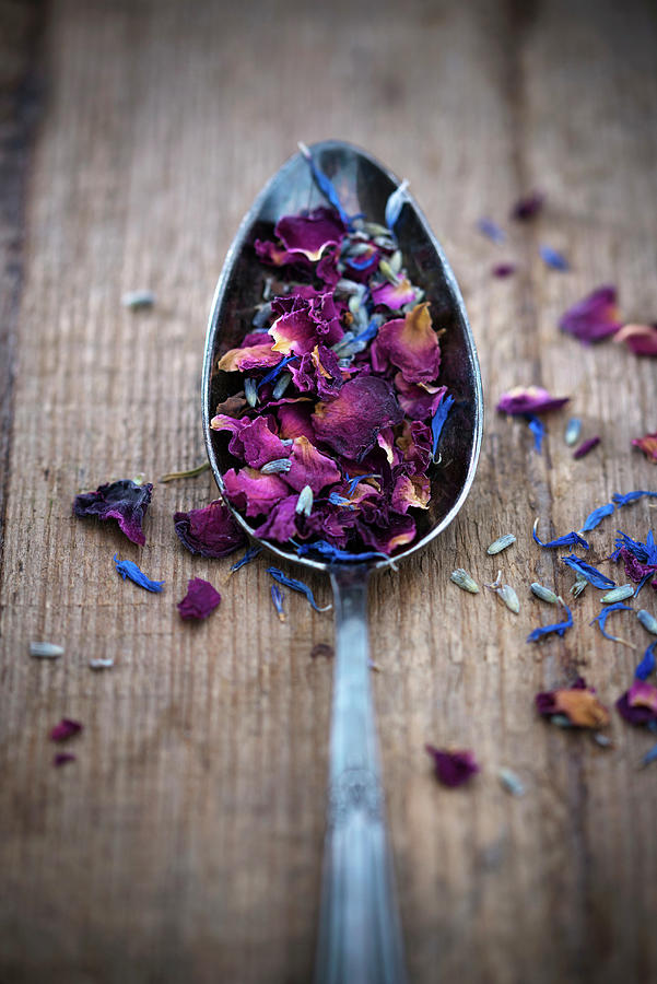 Dried, Edible Flower Petals On A Spoon Photograph by Kati Neudert