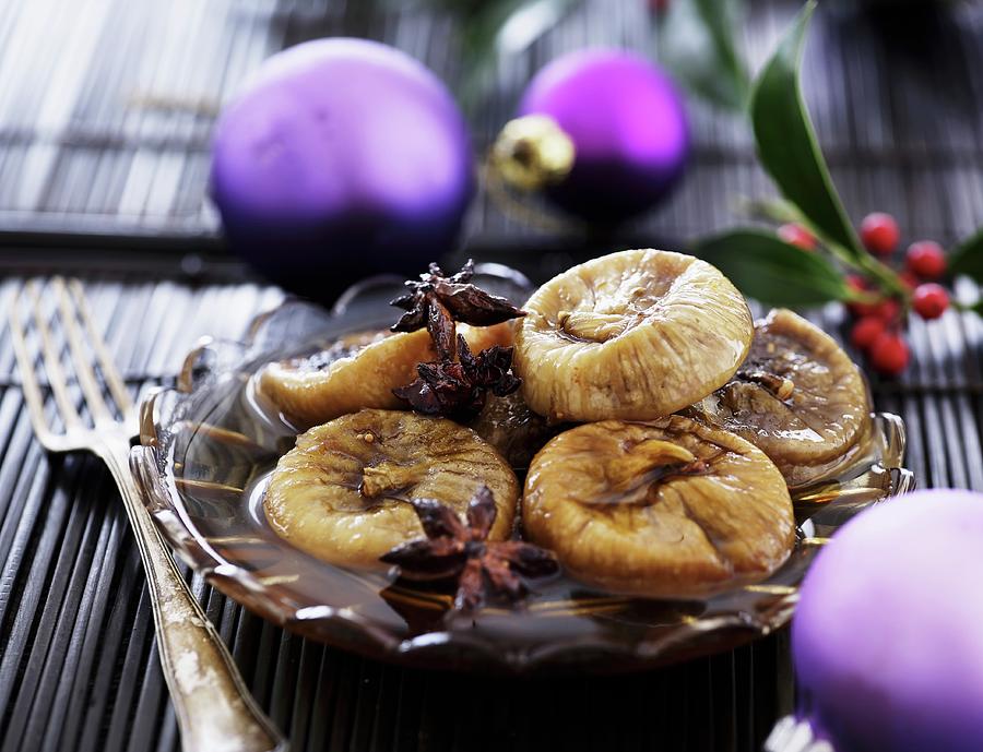 Dried Figs In A Spiced Syrup For Christmas Photograph by Mikkel Adsbl