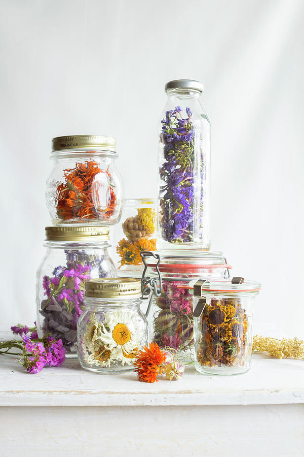 Dried Flowers In Screw-top Jars And Preserving Jars Photograph by Sabine Lscher