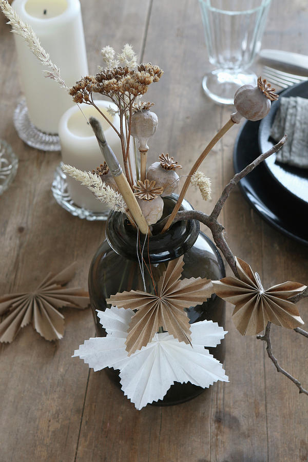 Dried Flowers In Vase, Poppy Seed Heads And Origami Maple Leaves Photograph by Regina Hippel