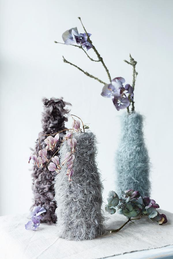 Dried Flowers In Vases In Knitted And Crocheted Covers Photograph by Sabine Lscher
