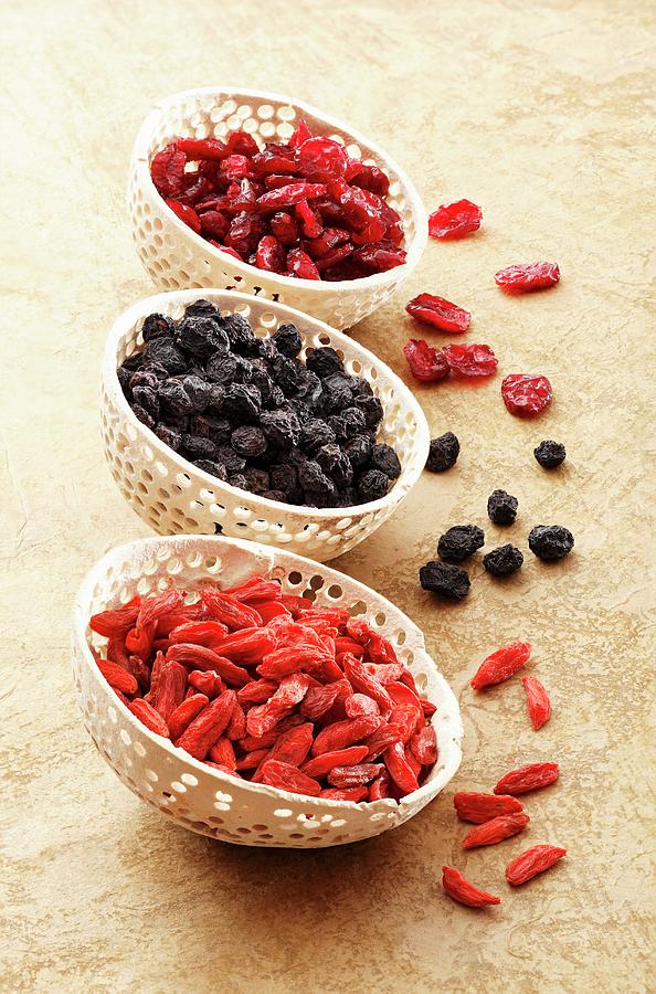 Dried Goji Berries, Aronia Berries And Cranberries Photograph by Petr Gross