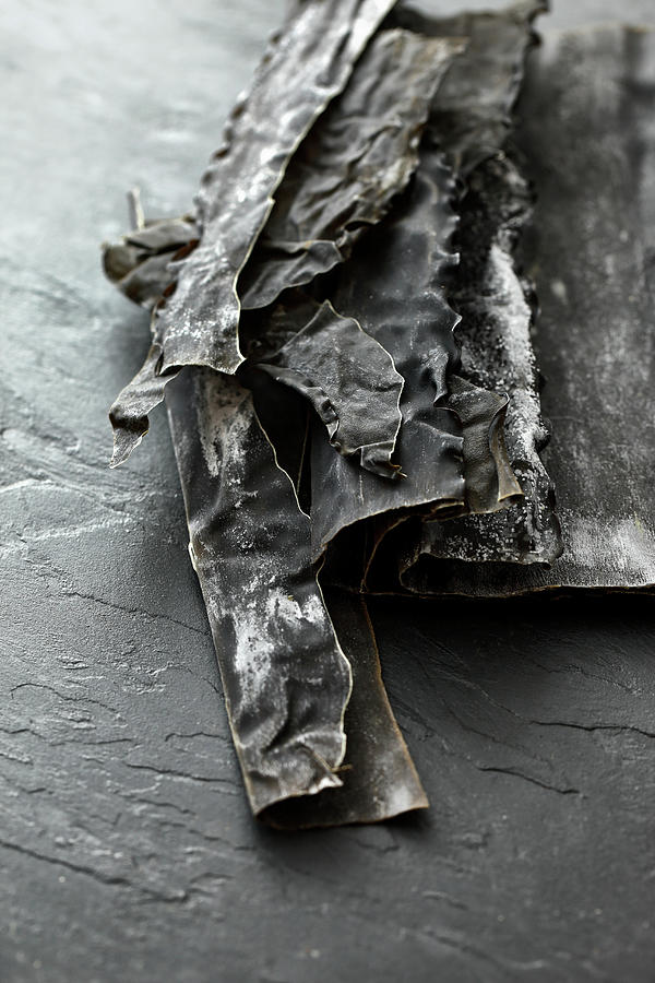 Dried Kombu Algae On A Slate Plate Photograph by Petr Gross