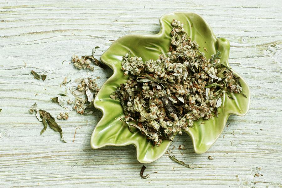Dried Mugwort With Flowers In A Leaf-shaped Bowl Photograph by Petr Gross