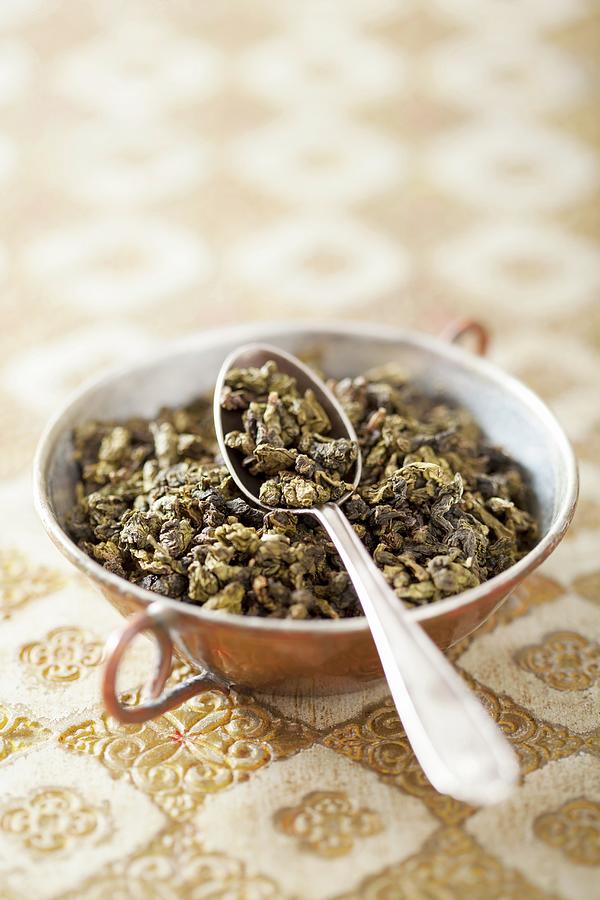 Dried Oolong Tea In A Small Bowl Photograph by Olga Miltsova