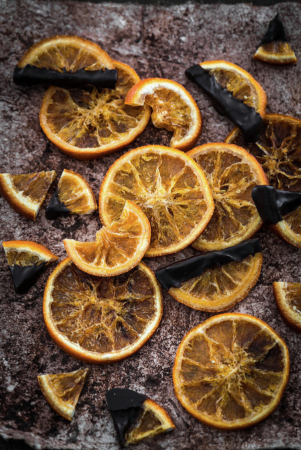 Dried Orange Slices With Cooking Chocolate Photograph by M. Nlke
