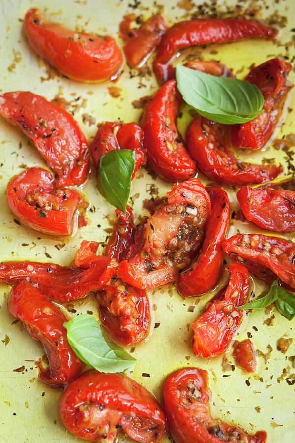 Dried Tomatoes In Olive Oil Photograph by Eising Studio