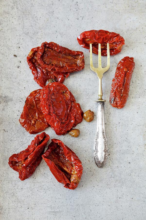 Dried Tomatoes With Capers In Olive Oil Photograph by Rua Castilho