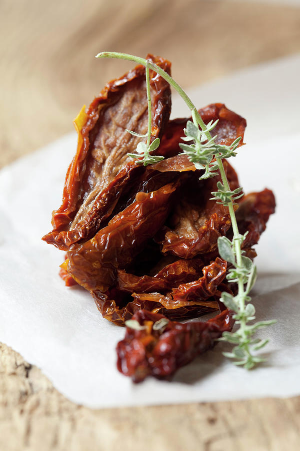 Dried Tomatoes With Lemon Thyme Photograph by Hilde Mche