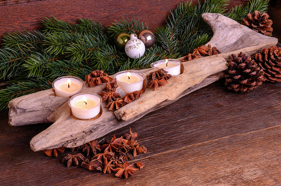 Driftwood Candle Holder Decorated For Christmas Photograph by Selbermachen Media / Gerald Freyer