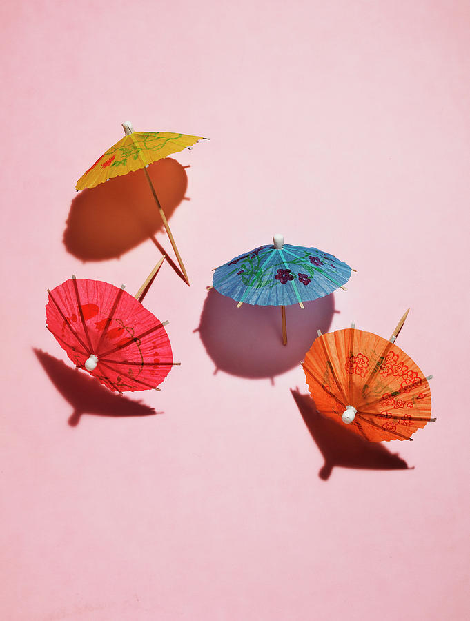 Drink Umbrellas On Pink Photograph by Tamara Staples