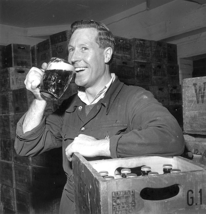 Drinking Beer Photograph by Evening Standard Drinking Beer Photograph by Evening Standard