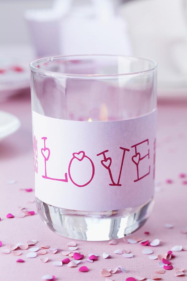 Drinking Glass Used As Lantern And Decorated With love Written On Paper Photograph by Franziska Taube
