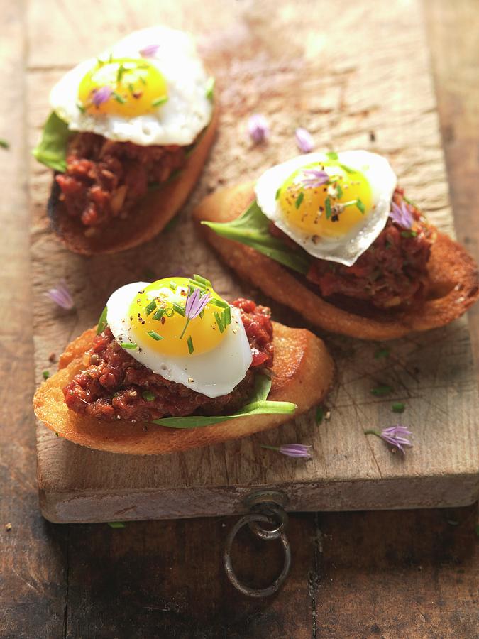 Dripping Crostini With Fried Egg Photograph by Joerg Lehmann
