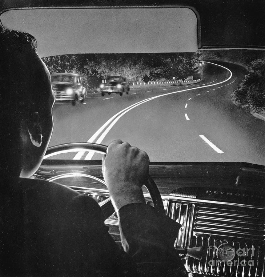 Driver Follows White Line On Highway Photograph by Bettmann
