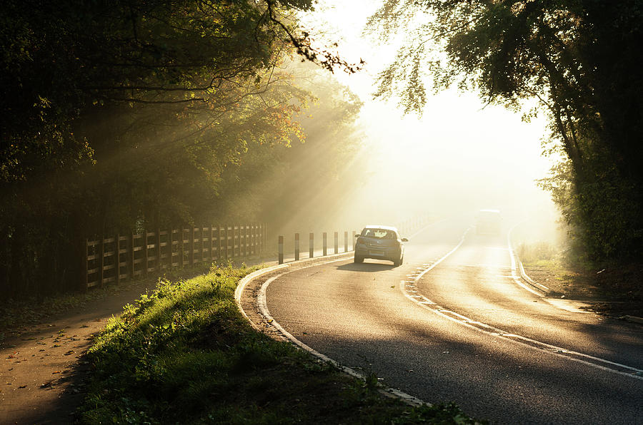 Driving In Light Photograph by Grzegorz Buczylowski