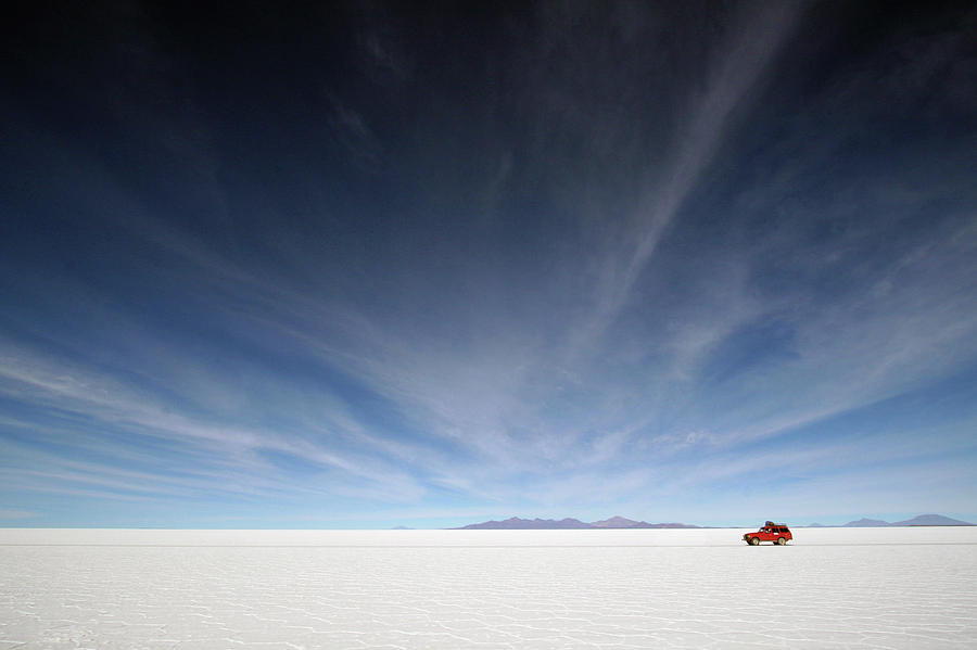 Transportation Photograph - Driving On The Salar by Andre Van Huizen