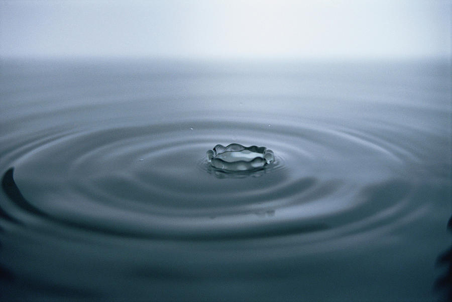 Drop Of Water Touching The Surface Of The Water, Purity, Freshness Photograph by Martin Bolle