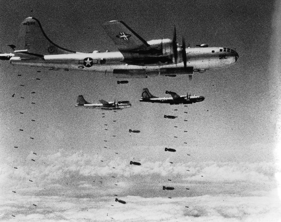 Dropping Bombs Photograph by Keystone