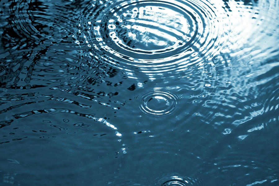 Drops Falling On Water Surface Photograph by Ldf
