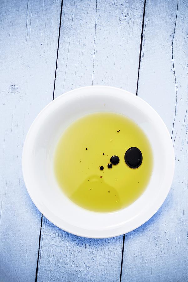 Drops Of Balsamic Vinegar In Olive Oil Photograph by Bernhard Winkelmann