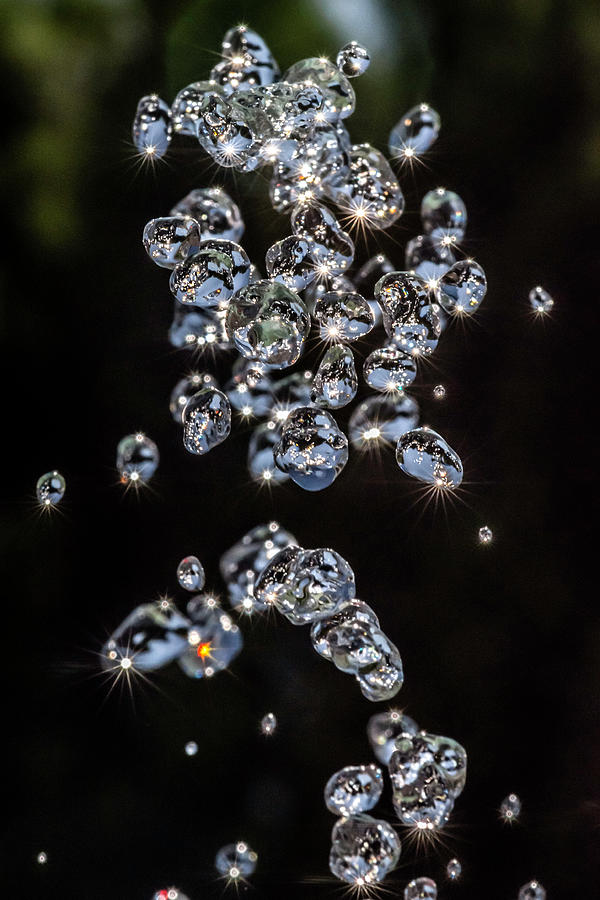 Drops up in the air Photograph by Wolfgang Stocker