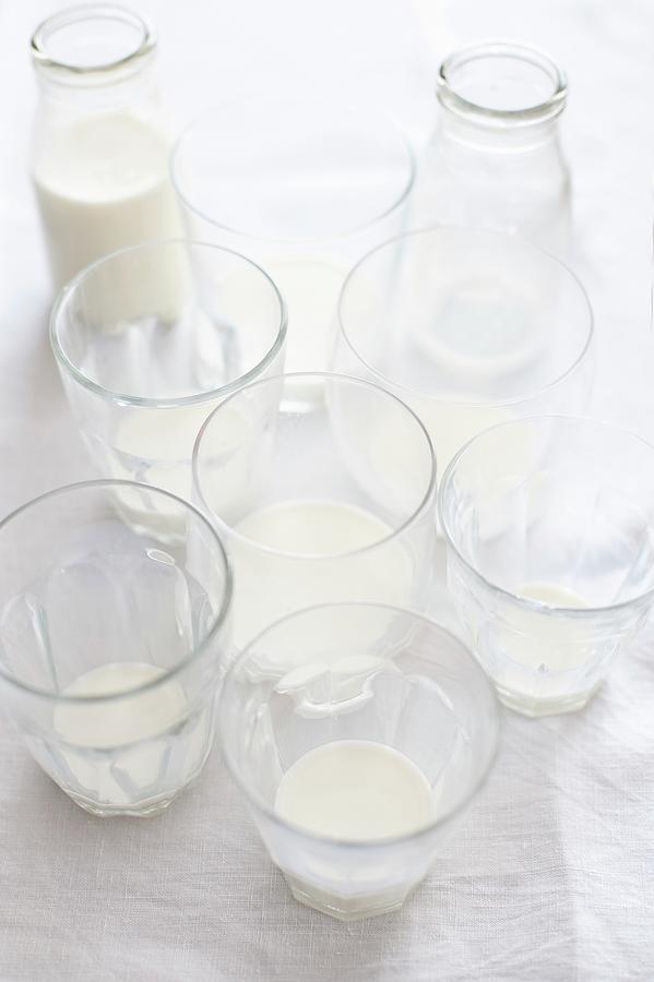 Drunk Glasses Of Milk And Milk Bottles Photograph by Studer, Veronika