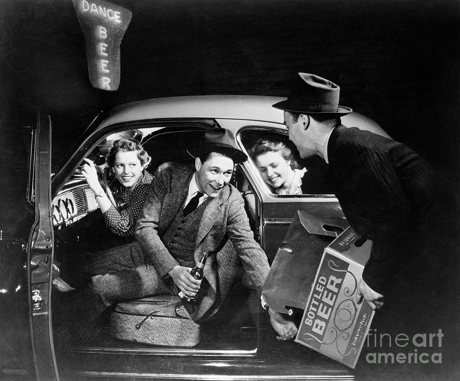 Beer Photograph - Drunken Driver Loading Beer In Car by Bettmann