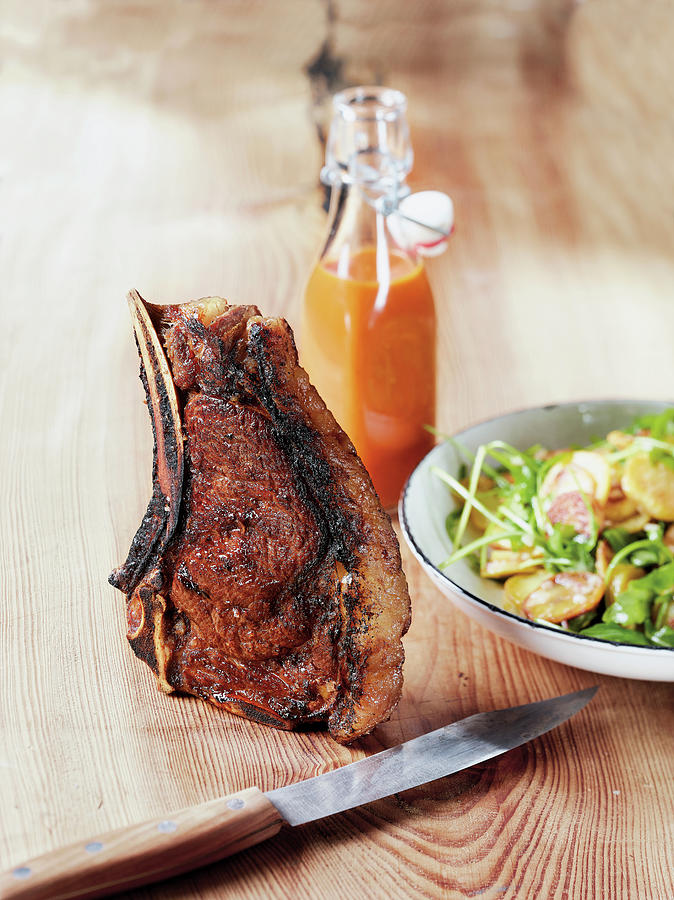 Dry-aged Hereford Prime Steak Made In A Beefer With A Fried Potato Salad Photograph by Tre Torri