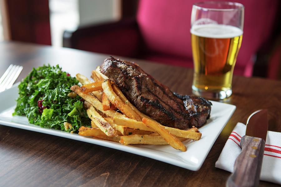Dry-aged New York Strip Steak With Fries And Green Kale Salad Photograph by Gus Cantavero Photography