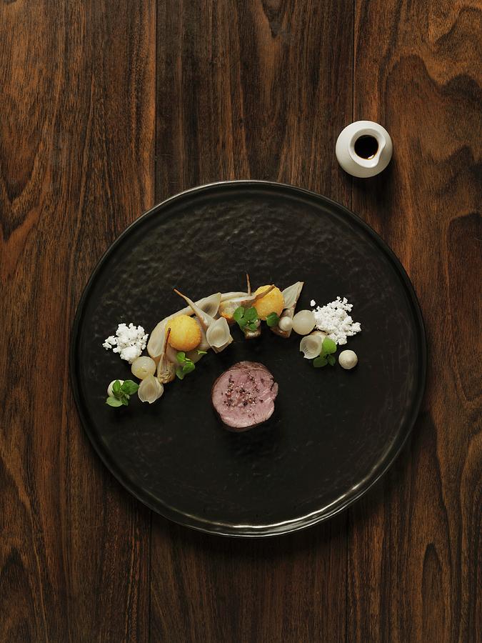 Dry-aged Veal With Onions, Artichokes, Mahon Cheese And Vinegar Jus Photograph by Jalag / Ren Riis
