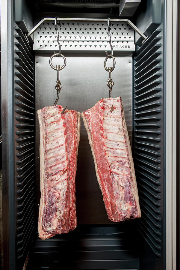 Dry Aging Meat In A Cold Store Photograph by Rita Newman