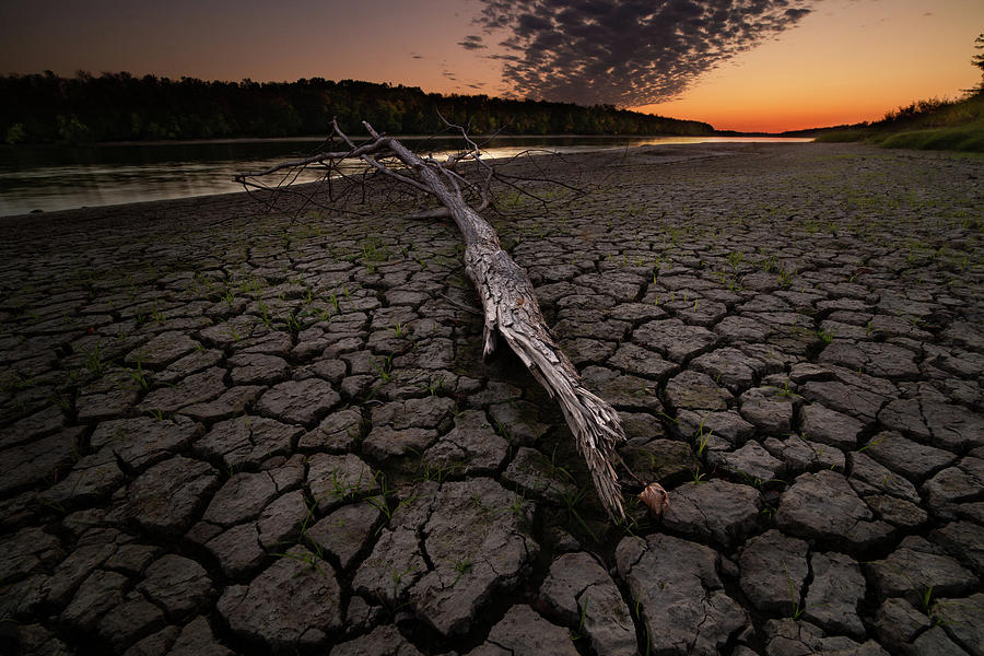 Dry Banks Of Rainy River After Sunset Photograph