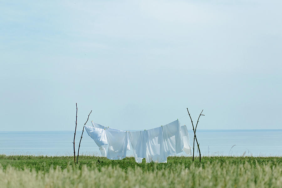 Summer Photograph - Drying Clothes In The Village by Cavan Images