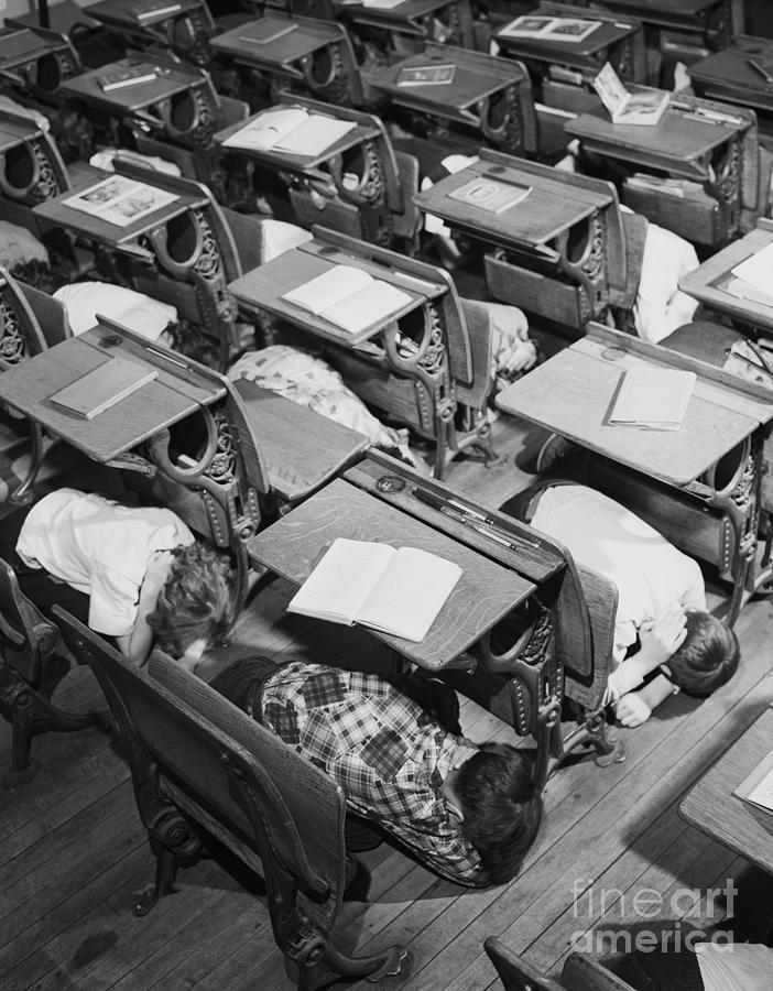 Duck And Cover Drill In School Classroom Photograph by Bettmann