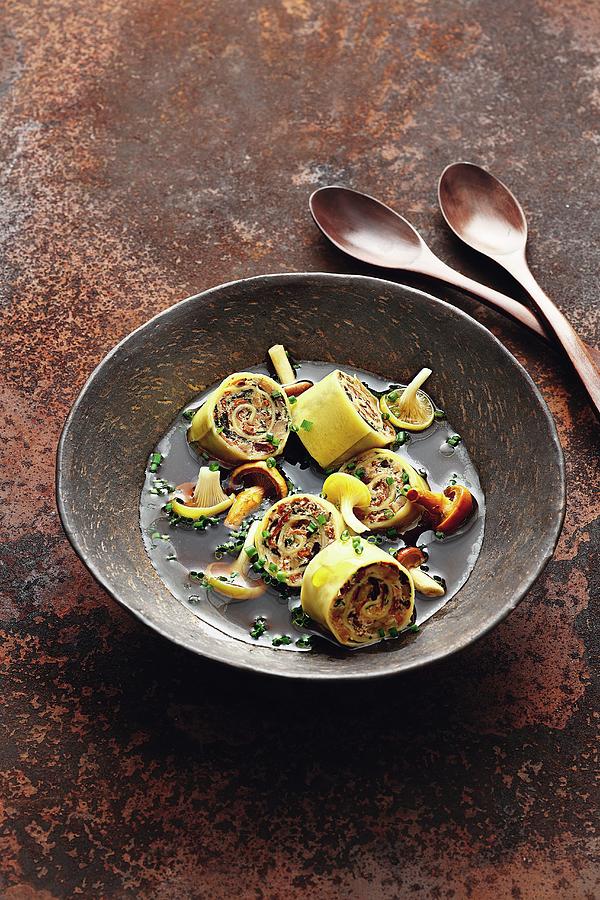 Duck Bouillon With Chestnut And Mushroom Cannelloni Photograph by Jalag ...