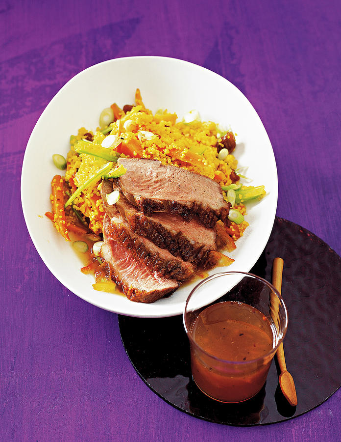 Duck Photograph - Duck Breast With Couscous Served On Plate by Jalag / Jan C. Brettschneider