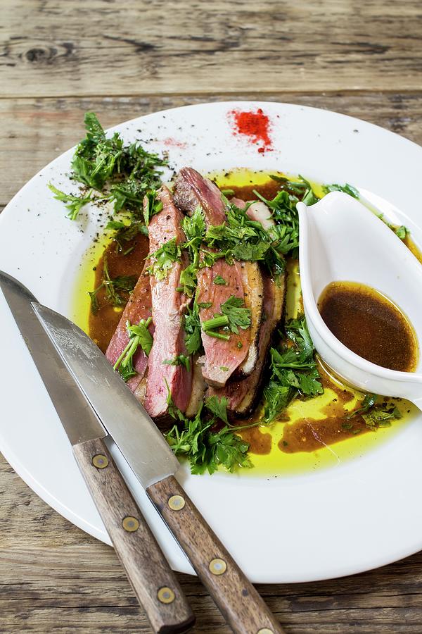 Duck Breast With Herbs And Jus Photograph by Vulman Pter