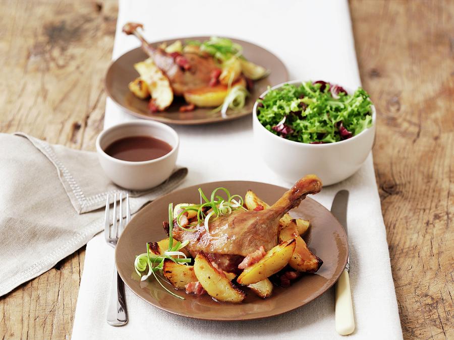 Duck Confit With Roast Potatoes And Salad Photograph by Frank Adam