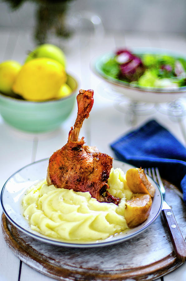 Duck Leg With Mashed Potatoes And Apple Photograph by Gorobina