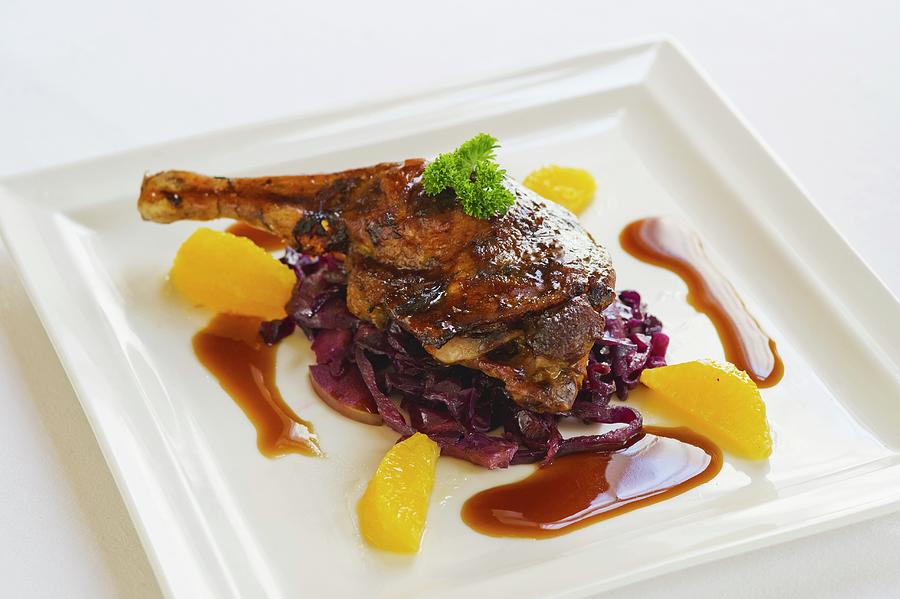 Duck Leg With Orange And Red Cabbage Photograph by Tim Winter