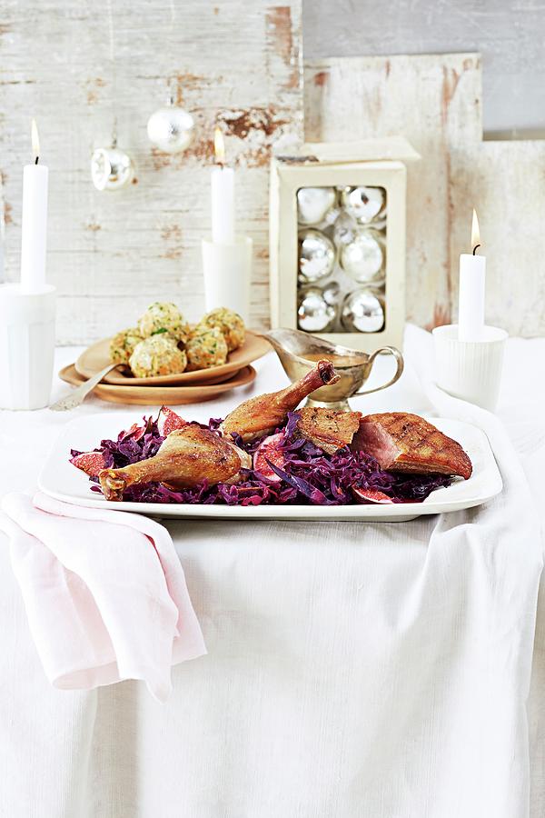 Duck On Fig-red Cabbage Served With Bread Dumplings For Christmas Dinner Photograph by Jalag / Maryam Schindler