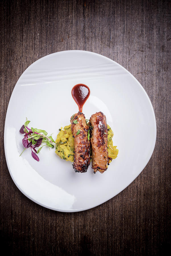 Duck Sausages On A Serving Dish Photograph by Nitin Kapoor