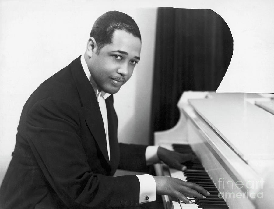 Duke Ellington Seated At The Piano Photograph by Bettmann