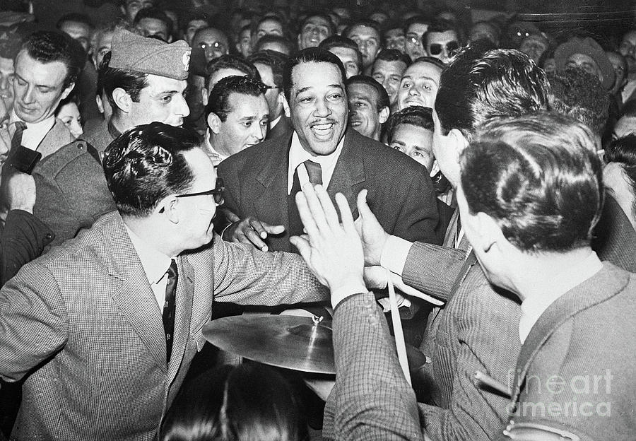 Duke Ellington Surrounded By Fans Photograph by Bettmann