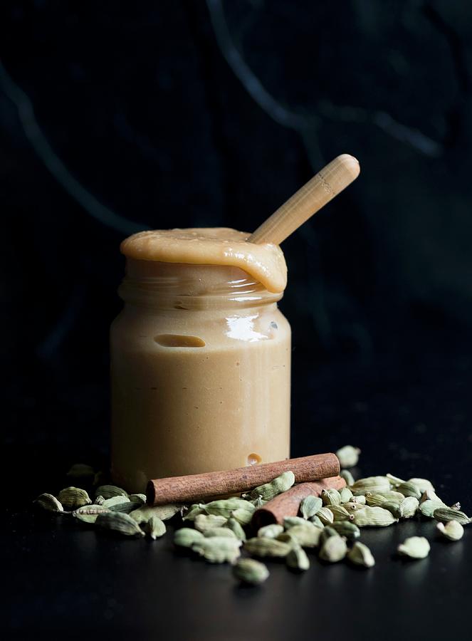 Dulce De Leche With Cardamom And Cinnamon Photograph by Hein Van Tonder