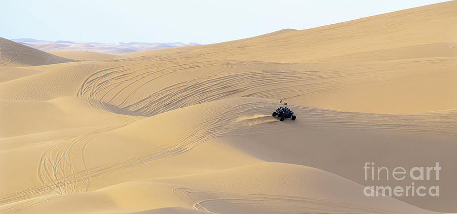 Dune buggy Crests the Top of a Hill Photograph by Daniel Ryan
