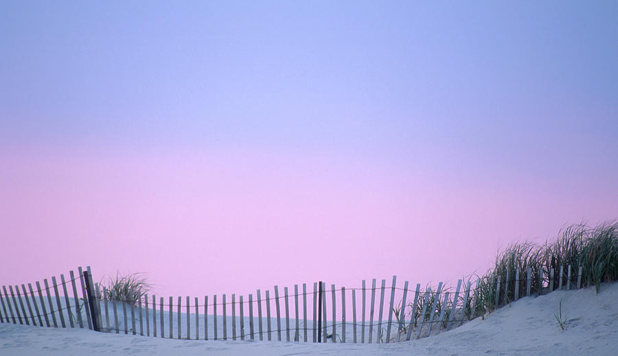 Dune Fence On The Beach With Sunset Sky Photograph by Kencanning